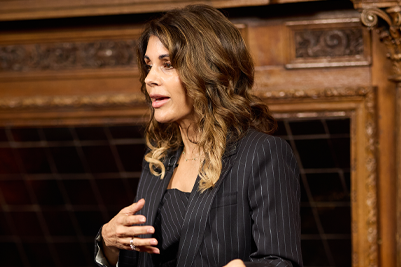 Anna speaks at an event